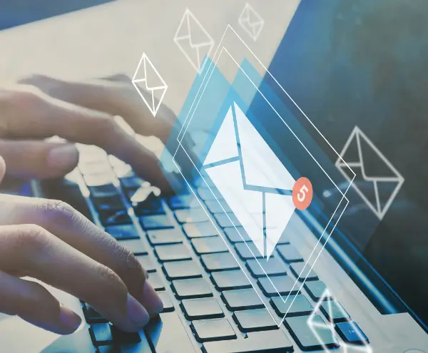 hands typing in laptop
