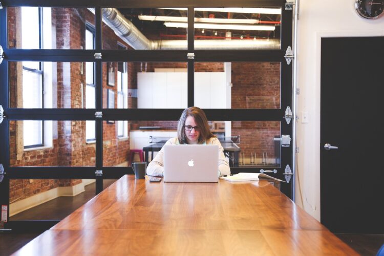 person working with the laptop