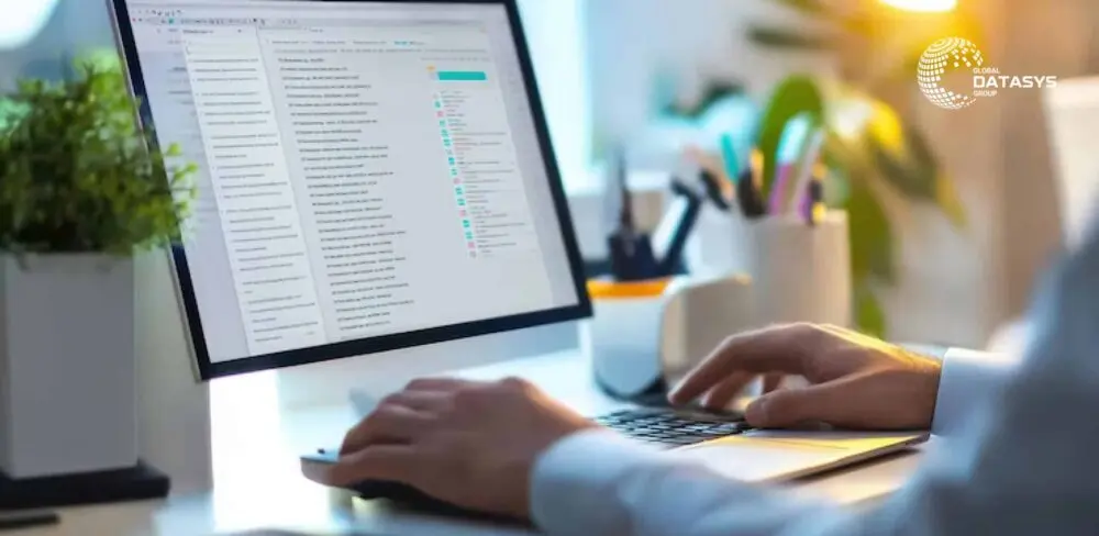man checking hr email list in a laptop